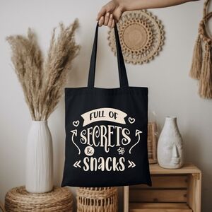 Custom Black Tote Full Of Secrets And Snacks